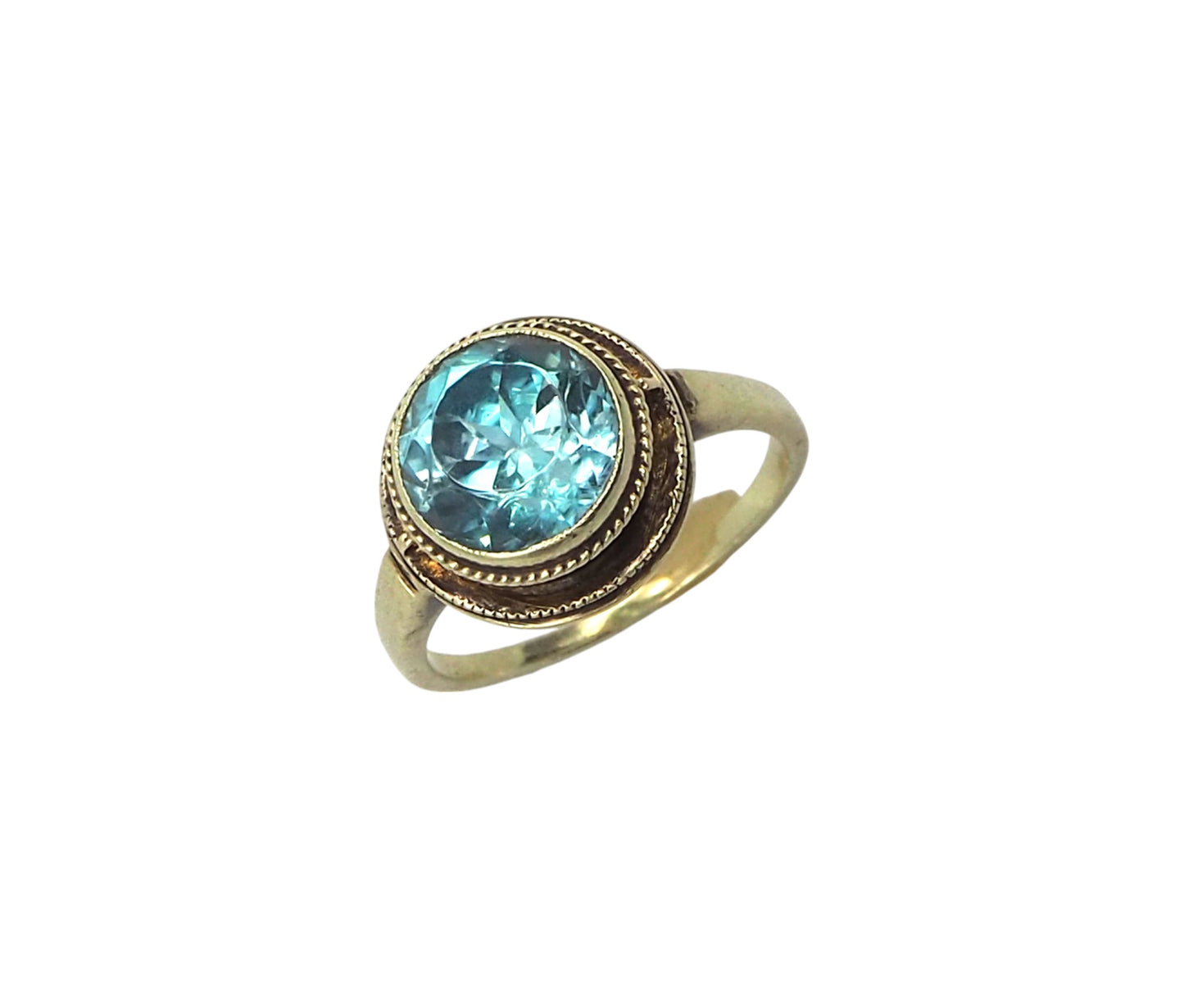 Anillo Art Decó con circonita azul en oro amarillo de 14 k