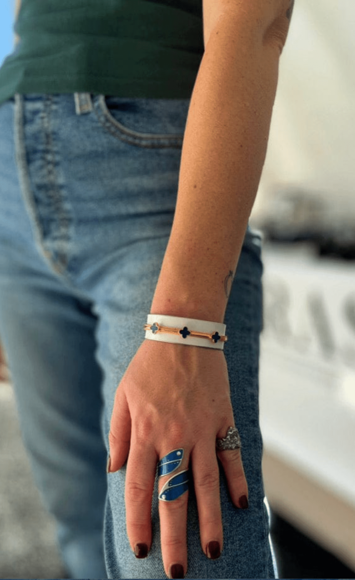 CRASH Jewelry Audi R8 Clover Cuff bracelet featuring a sleek silver design with a detailed clover emblem.