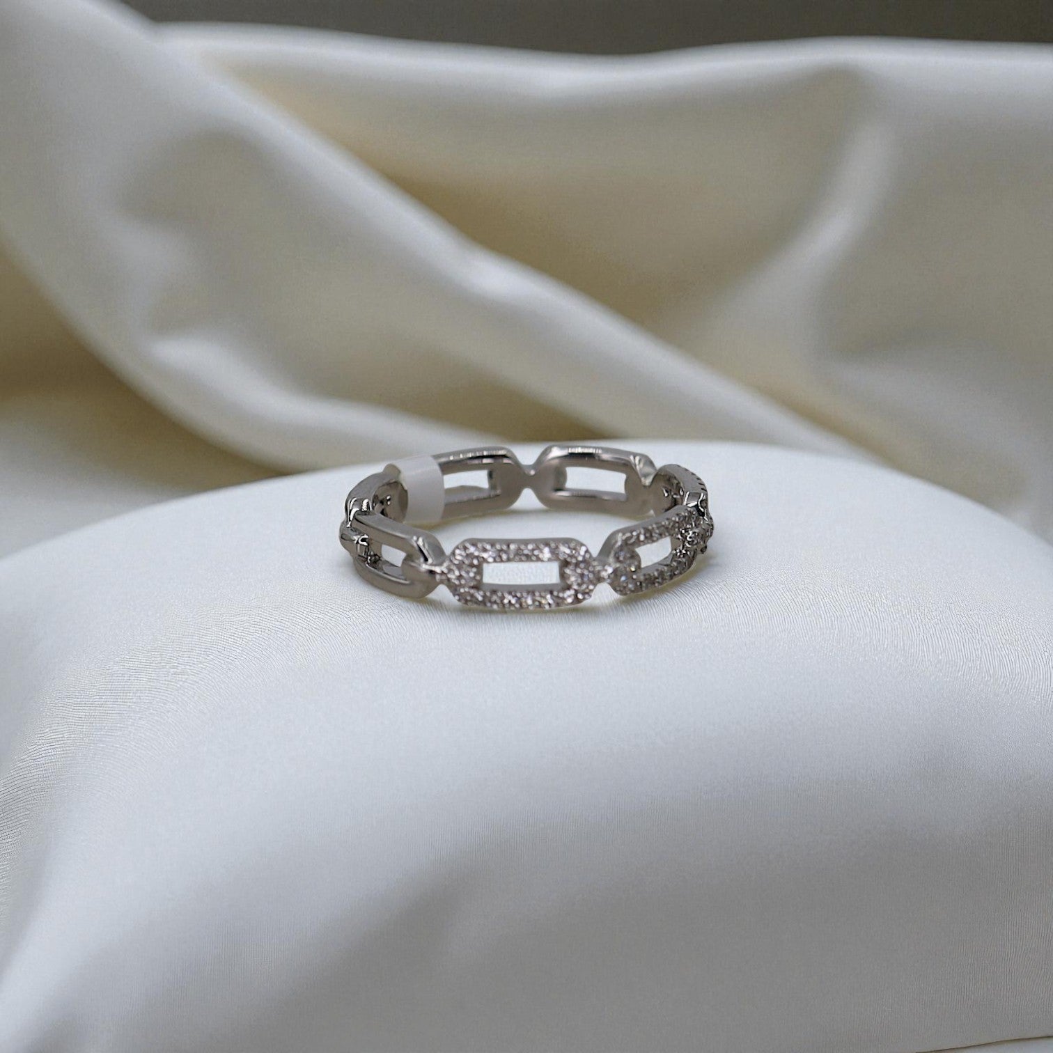 14k white gold diamond link band by Dilamani featuring sparkling diamond accents and a sleek, elegant design.
