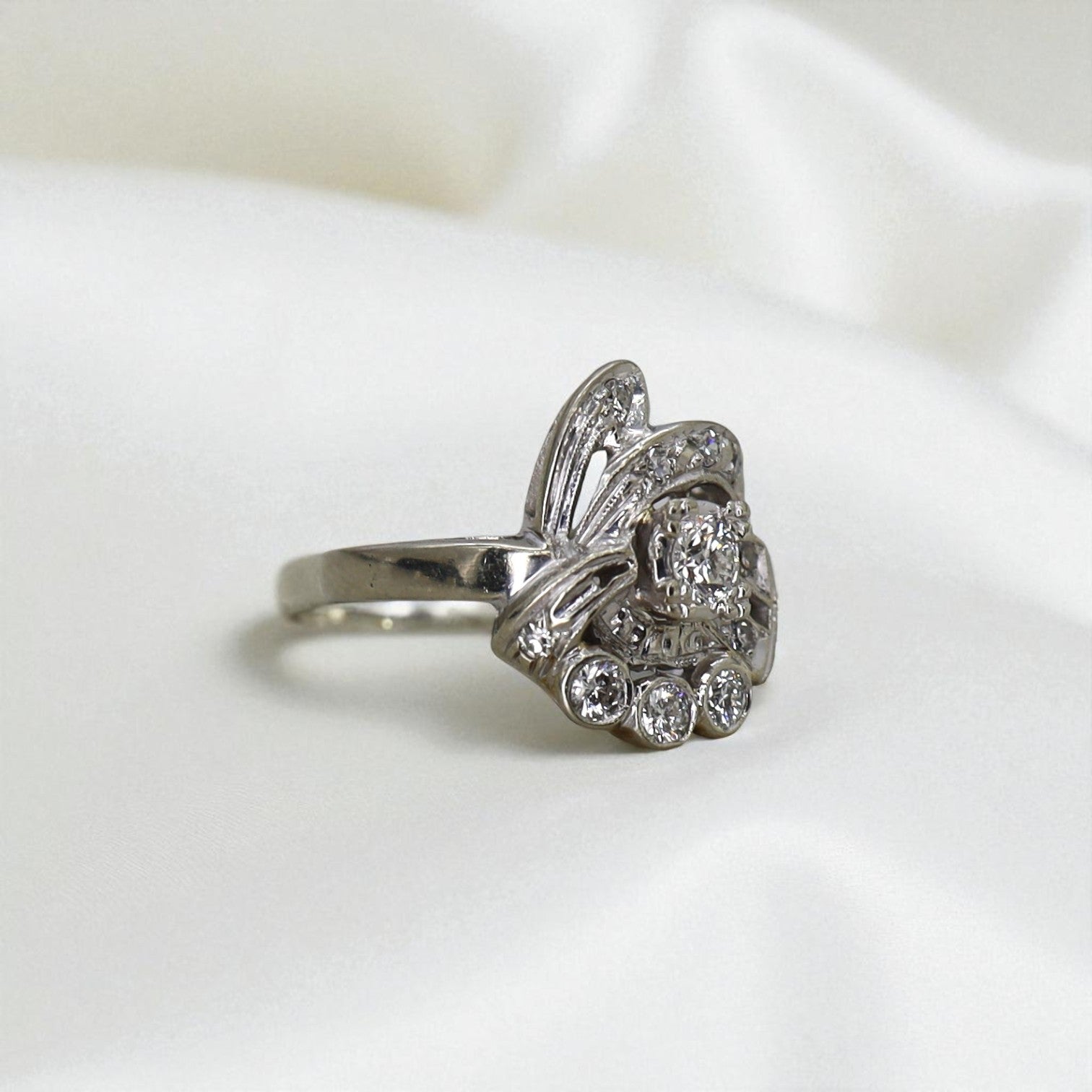 Vintage diamond cocktail ring in 14k white gold featuring a bold cluster design, perfect for statement jewelry.