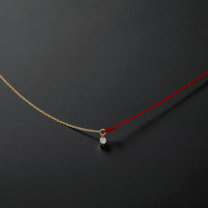 Contemporary Floating Diamond & Red Cord Necklace – 14k Yellow Gold