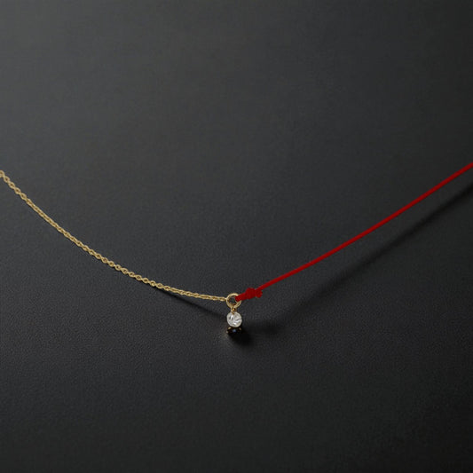 Contemporary Floating Diamond & Red Cord Necklace – 14k Yellow Gold