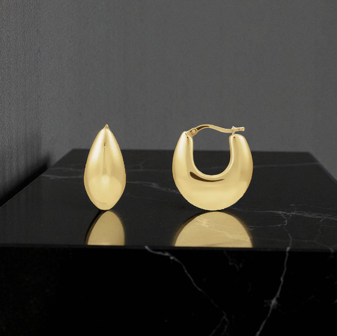 Electroformed hoop earrings by Petra Star in 14k gold or sterling silver, showcasing sleek, contemporary jewelry design.
