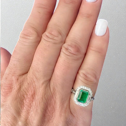 Emerald & Diamond Halo Ring in Platinum