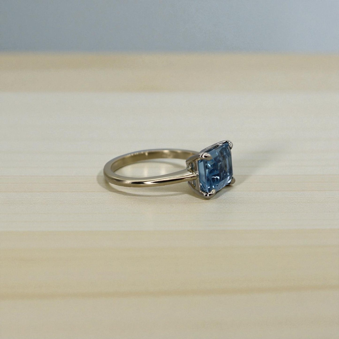 Aquamarine Emerald-Cut Solitaire in 14k Gold East-to-West Setting