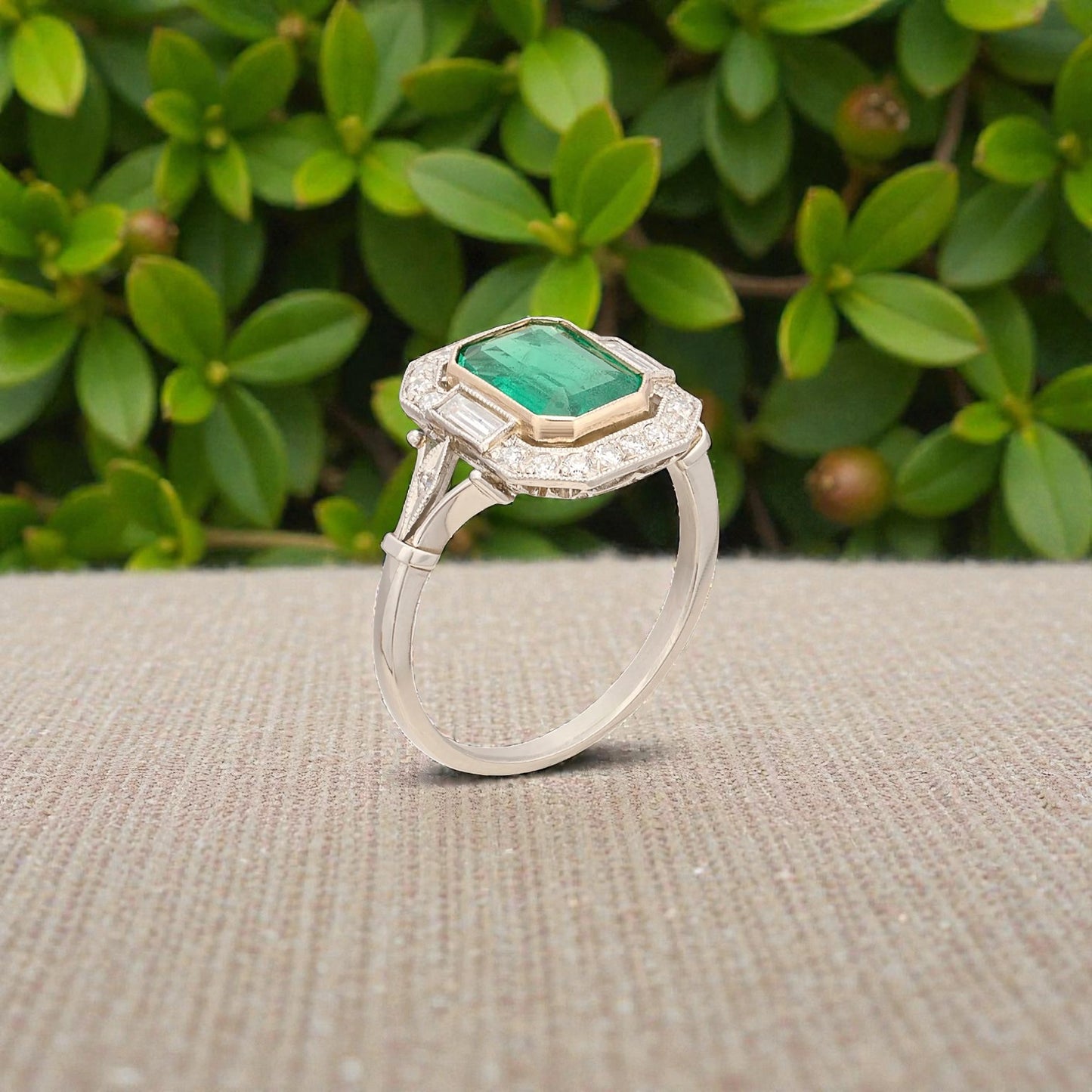 Emerald & Diamond Halo Ring in Platinum