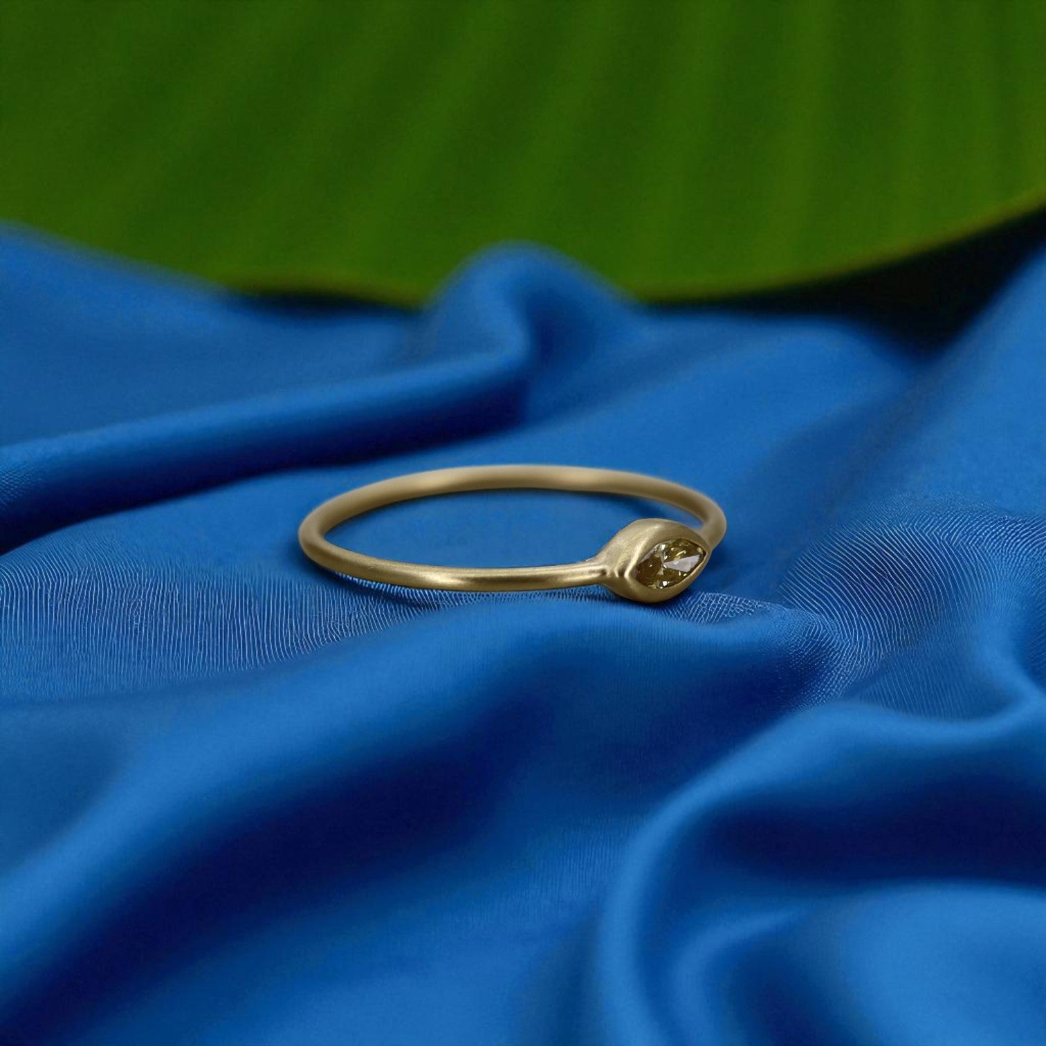 Yellow diamond marquise stacker ring by Petra Star featuring a vibrant yellow diamond set in a sleek ring design.
