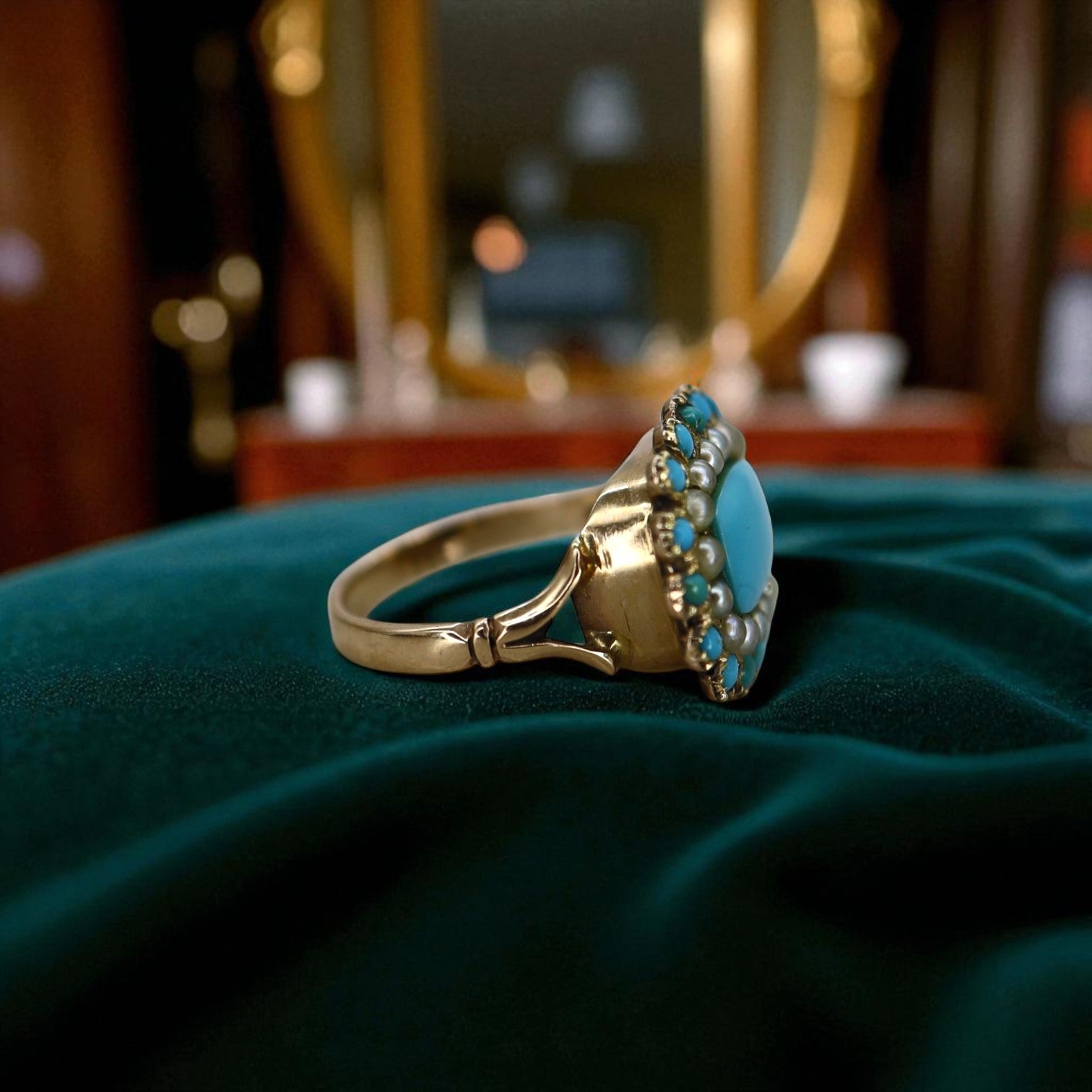 Victorian turquoise ring with pearls featuring intricate vintage design, crafted by The Vintage Vault.