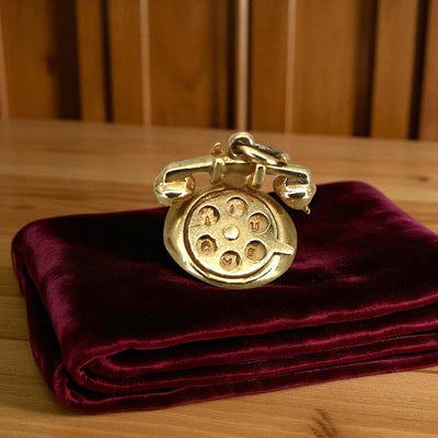 14k gold "I Love You" rotary telephone charm from The Vintage Vault, detailed design with a small loop for jewelry.