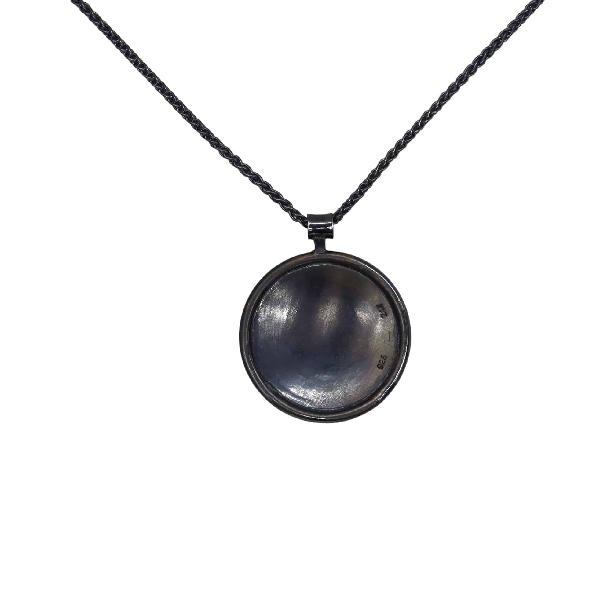 Andrew Zaruba Keum-Boo Celtic Weave pendant showing intricate metalwork and Celtic design on a silver-toned pendant.