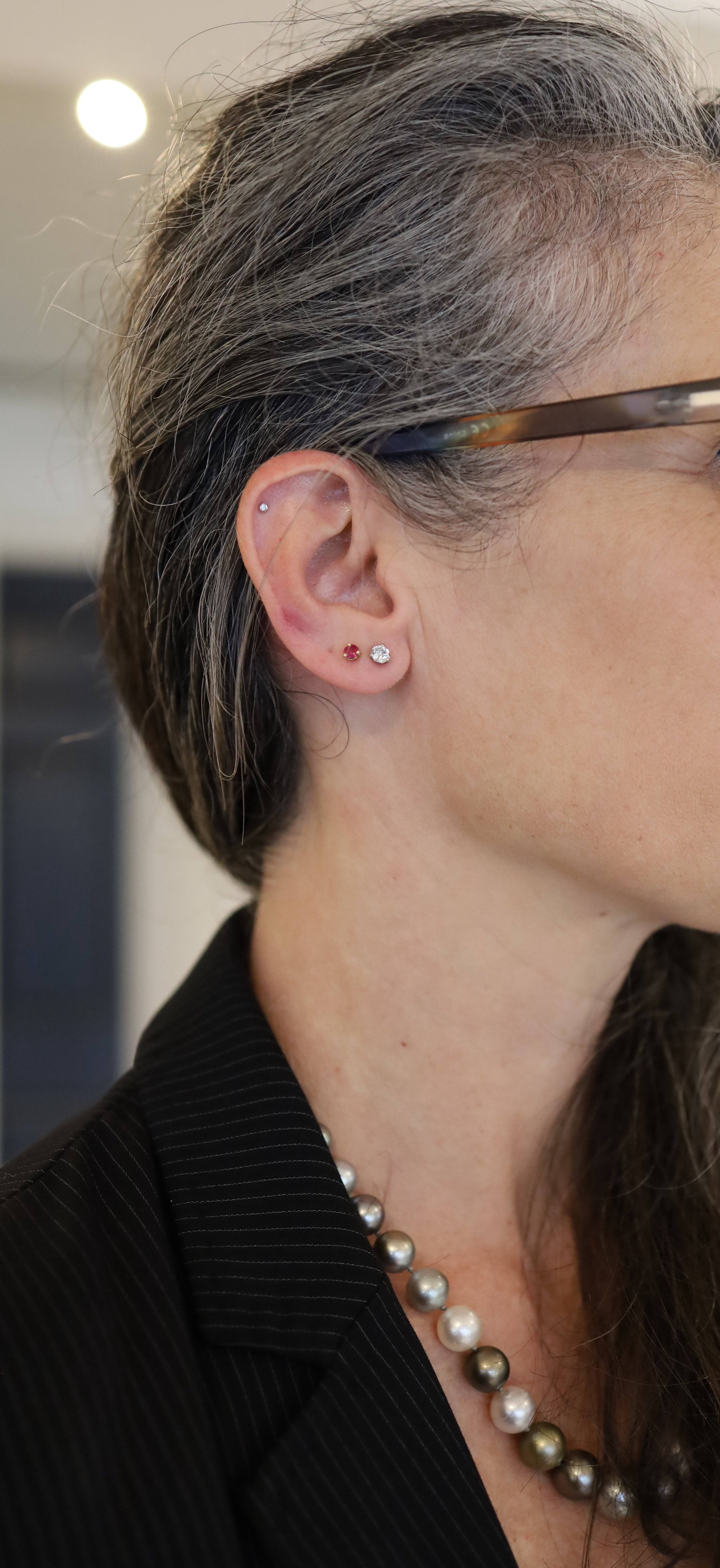 Petra Star Martini Diamond Stud Earrings featuring sparkling diamond stones set in a sleek earring design.