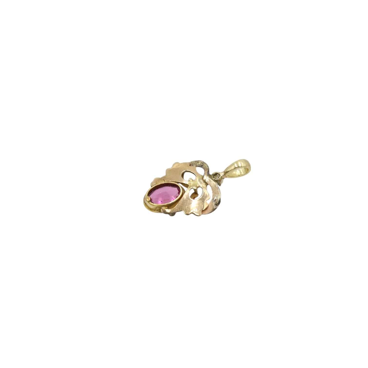 Antique Art Nouveau pink sapphire and enamel charm pendant featuring intricate floral design, crafted by The Vintage Vault.