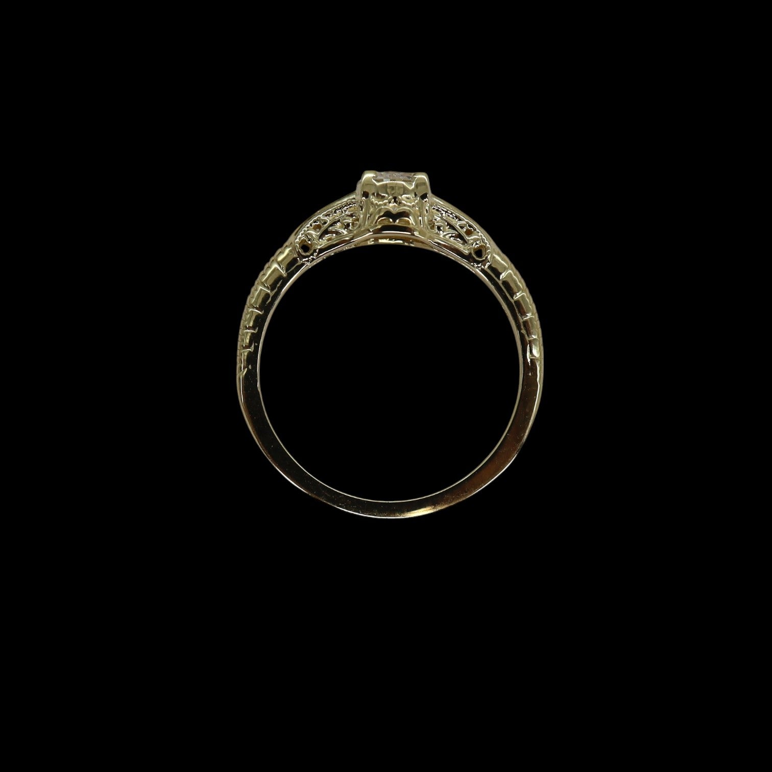 Victorian-inspired solitaire engagement ring by Petra Star featuring a central gemstone set in an elegant vintage-style band.
