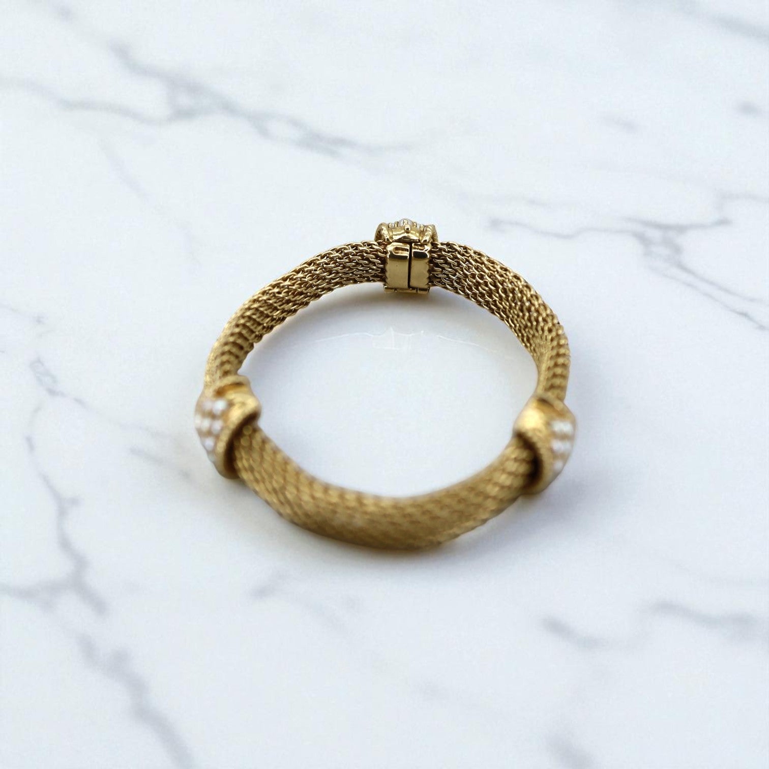 Vintage 14k gold mesh weave bracelet from The Vintage Vault, featuring a delicate, intricate design and fine craftsmanship.