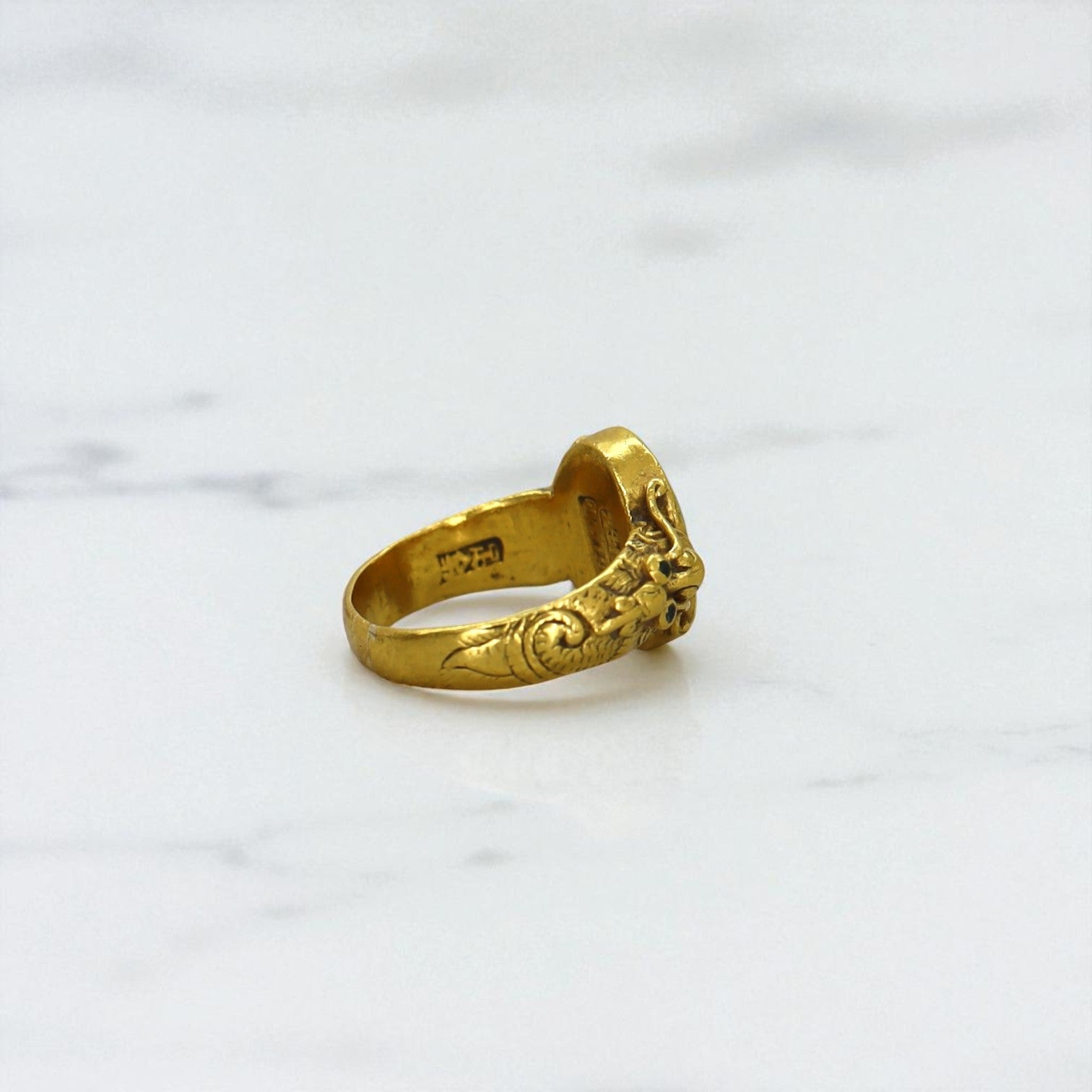 Art Nouveau Chinese jade ring with 24k gold accents, featuring intricate design and smooth jade gemstone in a vintage style ring.