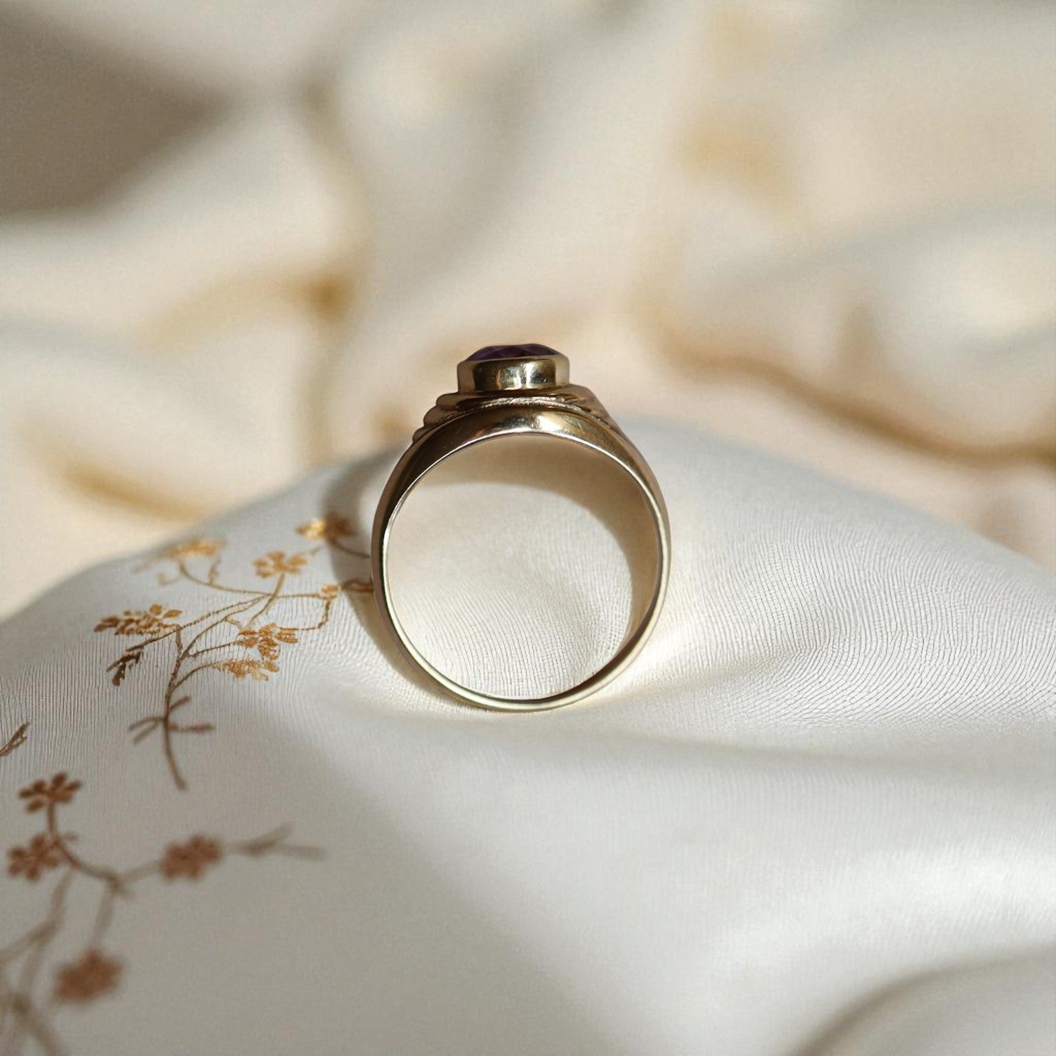 Vintage 1990s bezel set amethyst ring in heavy 14k yellow gold with tapered dome design, crafted by The Vintage Vault.