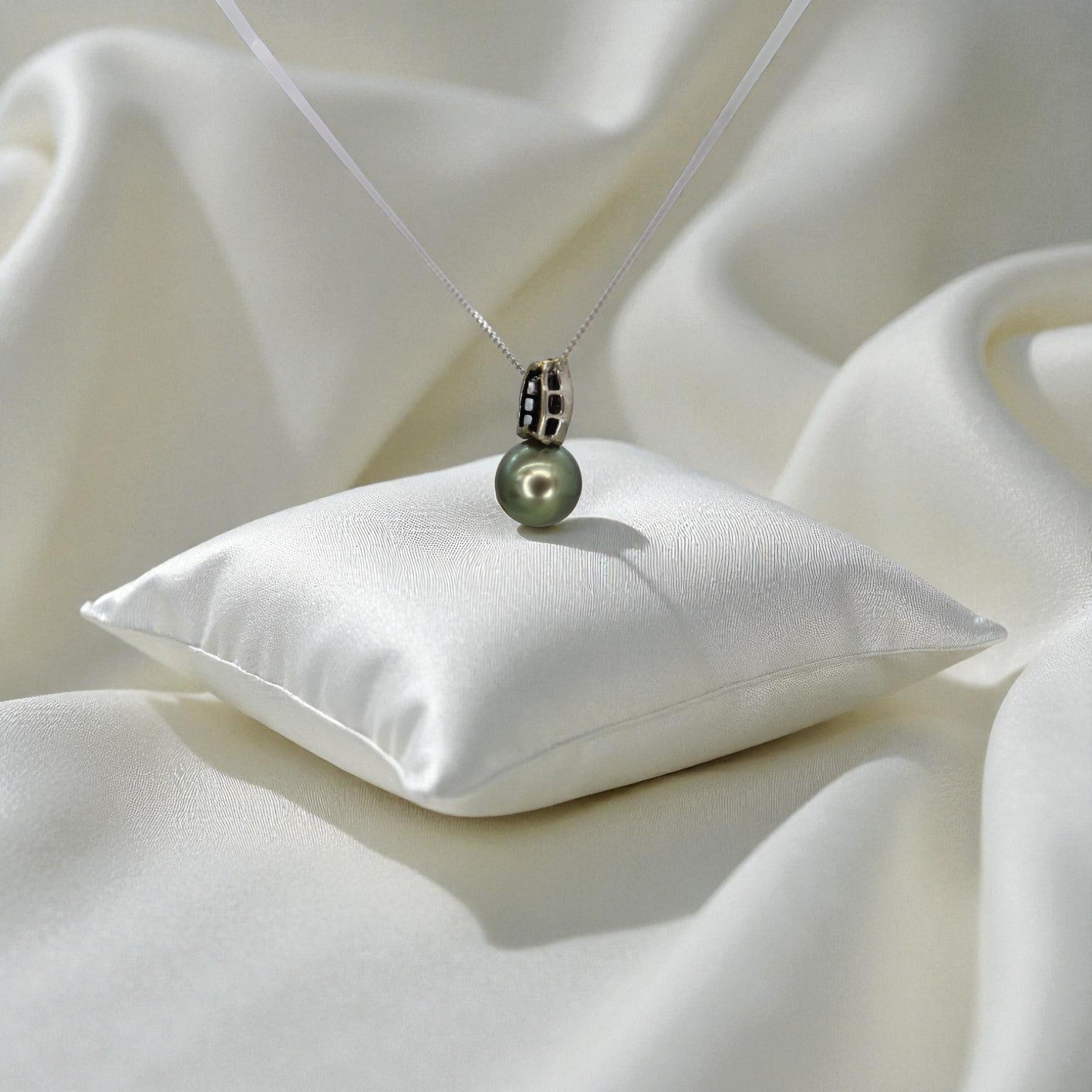 Upcycled Tahitian pearl and diamond pendant necklace on 14k white gold chain with hidden bail, featuring elegant jewelry design.