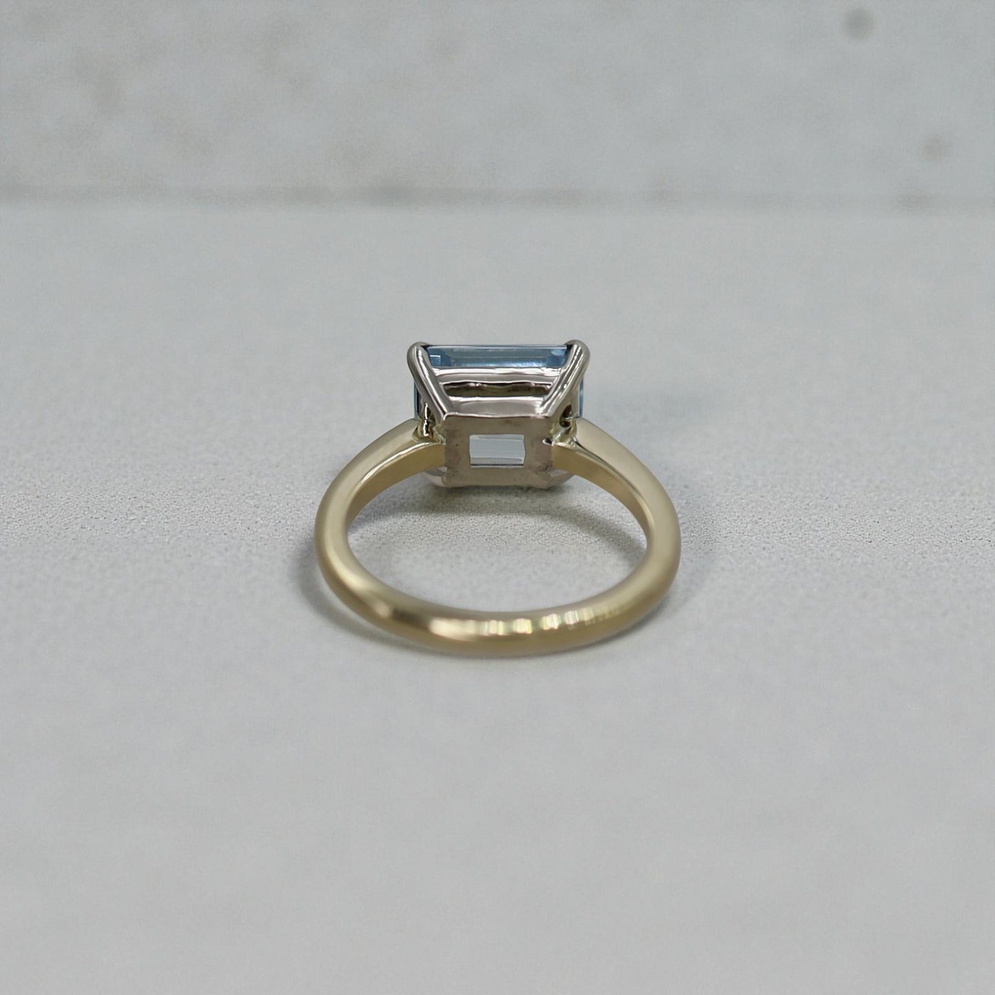 Aquamarine Emerald-Cut Solitaire in 14k Gold East-to-West Setting