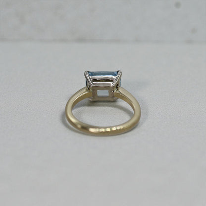 Aquamarine Emerald-Cut Solitaire in 14k Gold East-to-West Setting