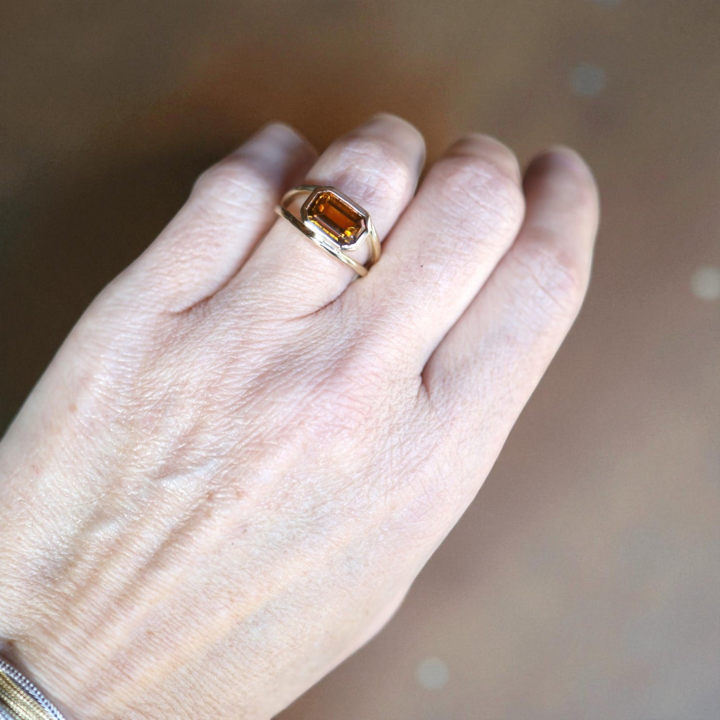 Ethically Mined Emerald Cut Orange Tourmaline Ring in 14k Yellow Gold