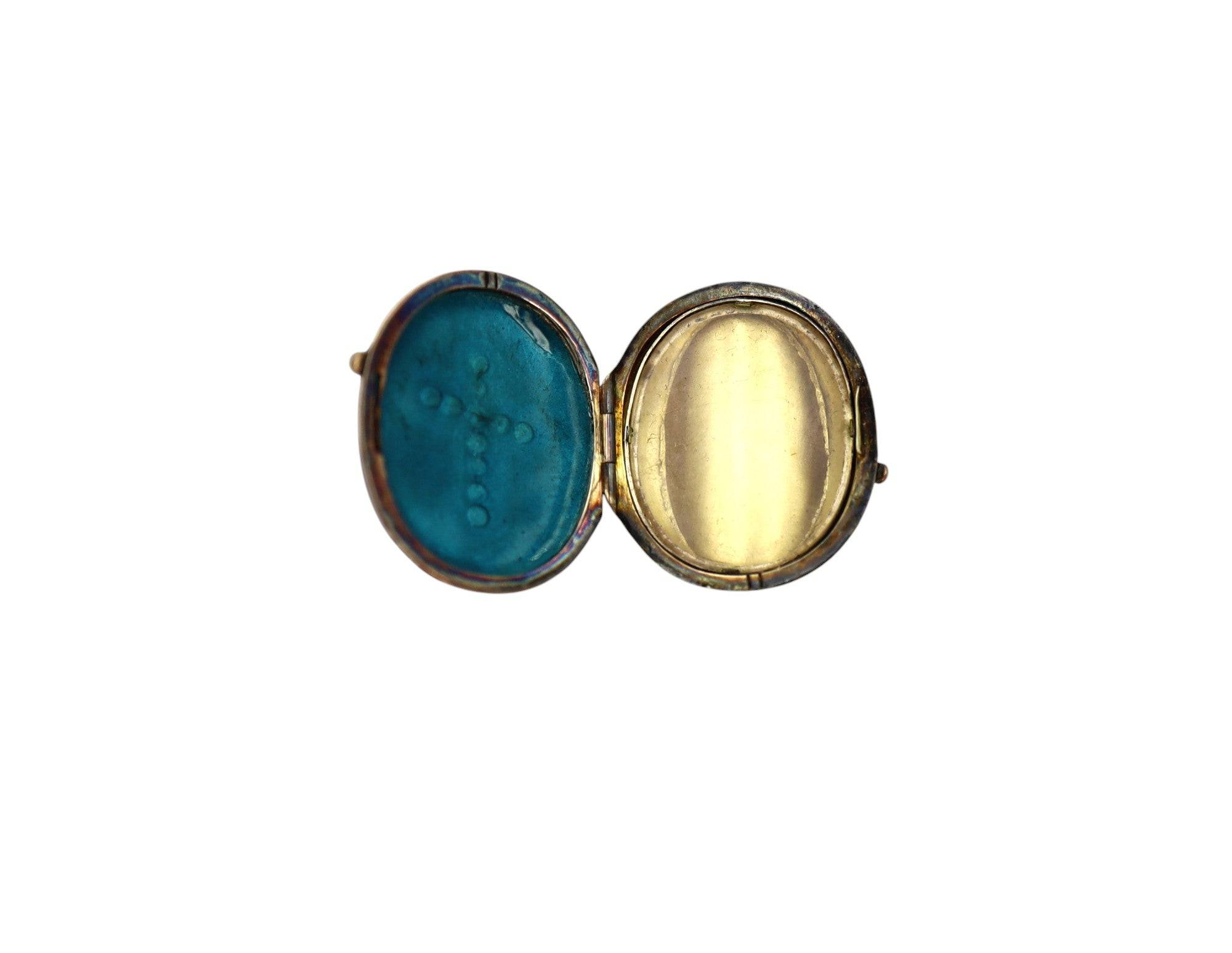Large Victorian silver locket ring with intricate design, showcasing vintage elegance and detailed craftsmanship.