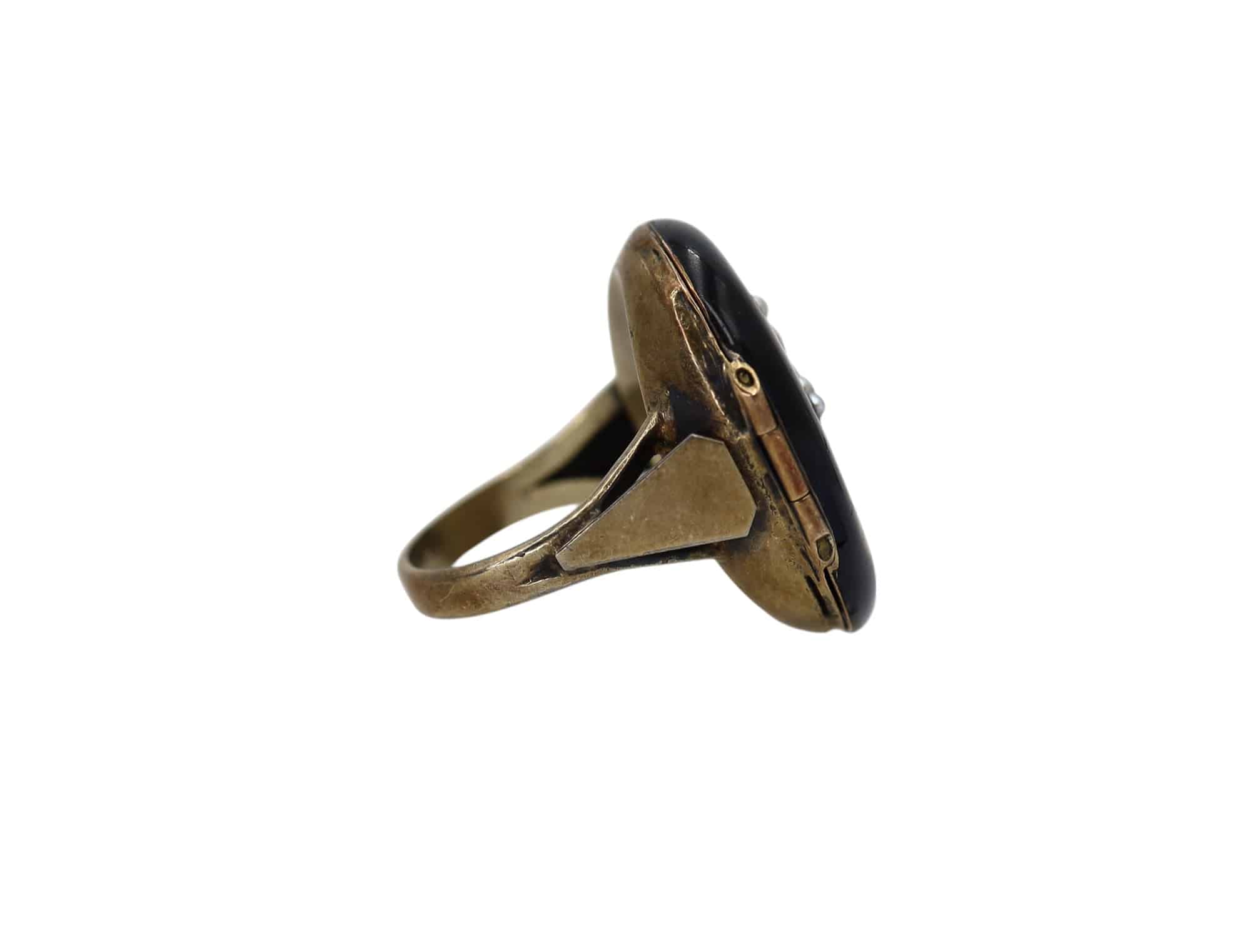Large Victorian locket ring in silver featuring intricate design, crafted by The Vintage Vault, shown on a white background.
