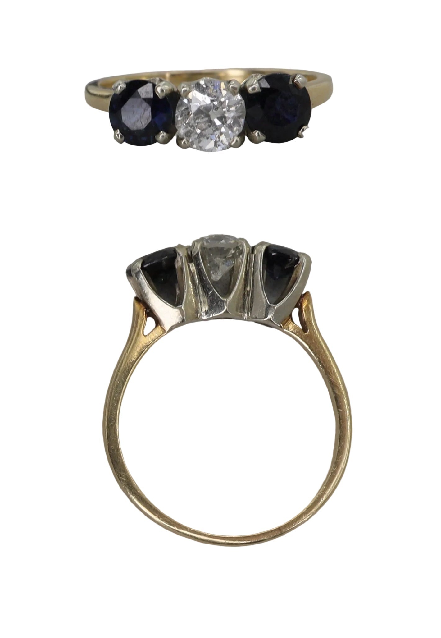 Silver J. Ruffo three stone ring with three sparkling gemstones set on a sleek band, showcasing elegant jewelry design.