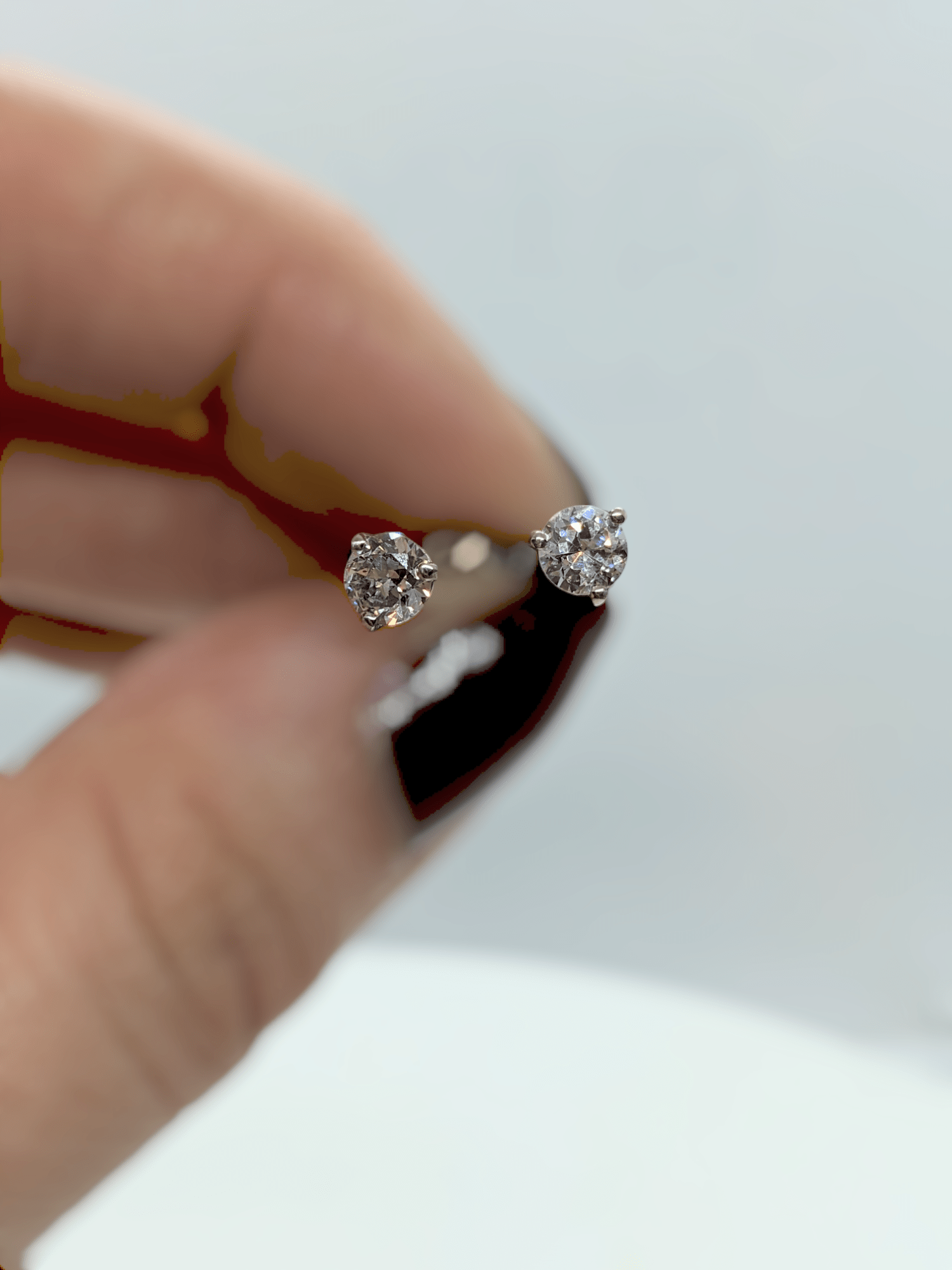 Petra Star Martini Diamond Stud Earrings with sparkling diamond stones on sleek metal settings