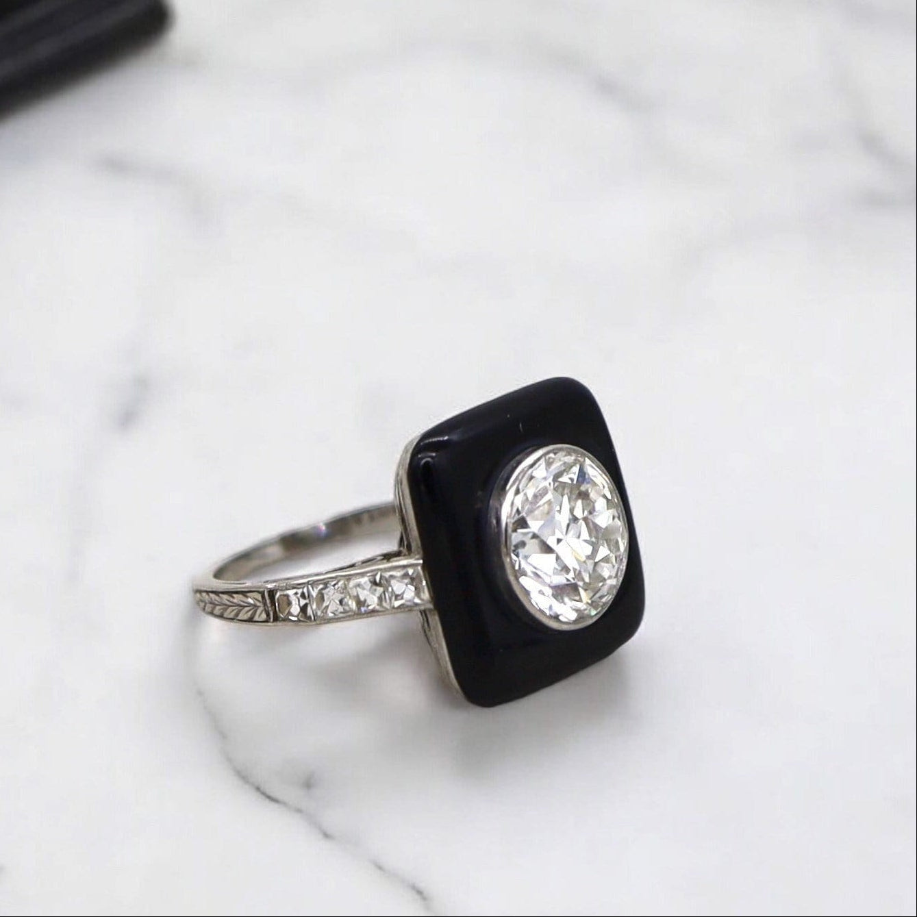 Art Deco Tiffany & Co. Onyx and Diamond Ring - Petra Star