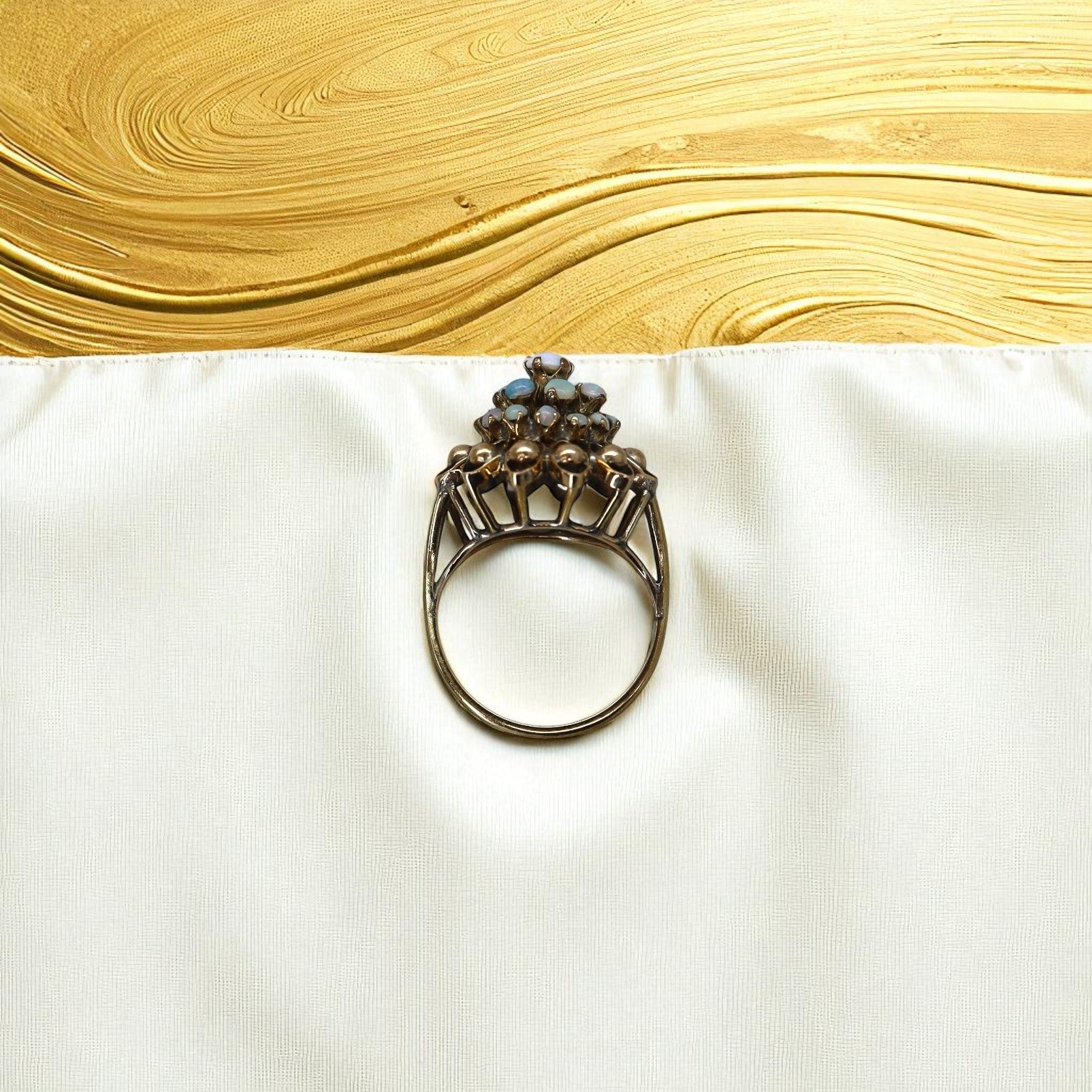 Vintage 1940s white opal cluster harem ring with gold-filled band, statement cocktail jewelry featuring intricate design details.