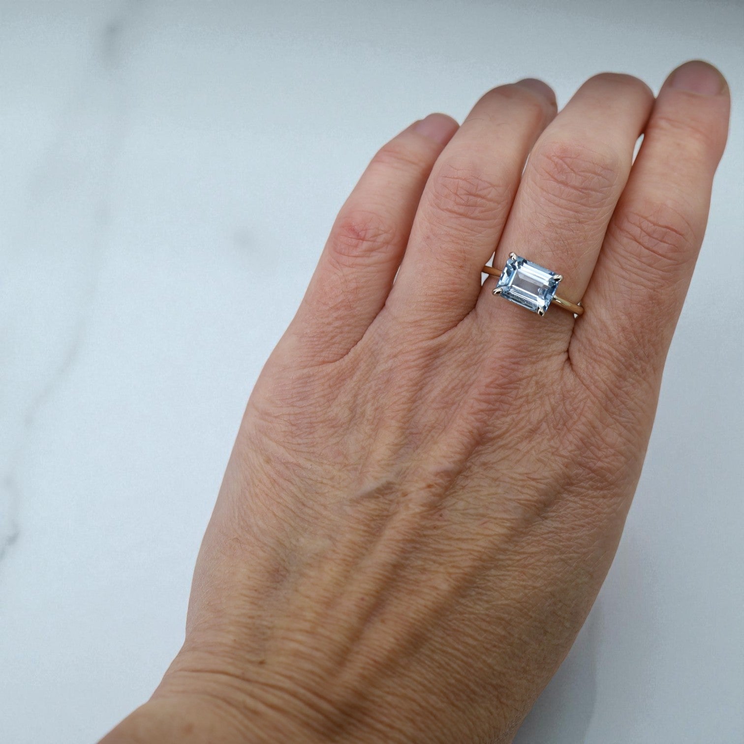 Aquamarine 3.24 ct Emerald-Cut Solitaire in 14k Gold East-to-West Setting - Petra Star