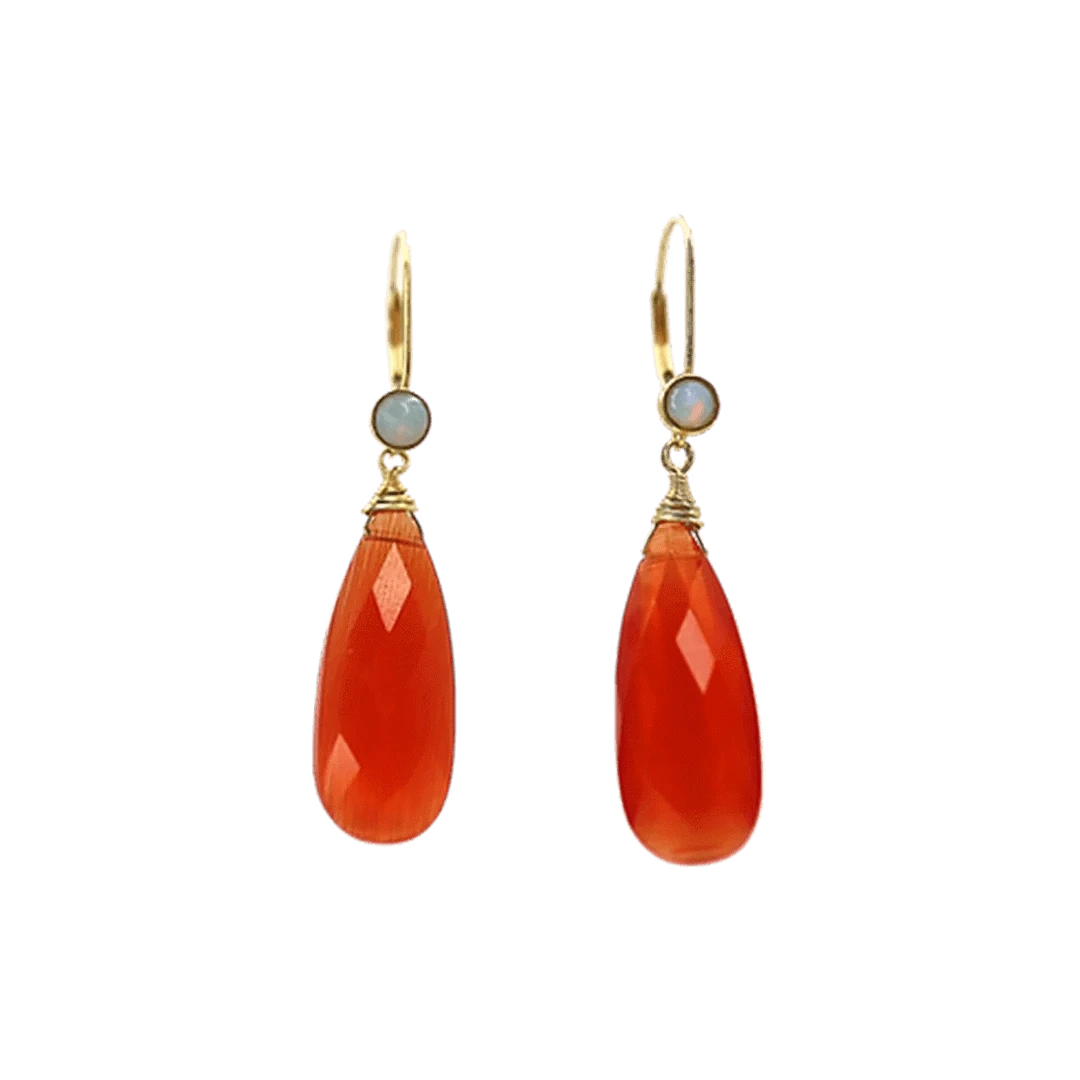 Petra Star Firestarter earrings featuring fiery, flame-inspired design in gold-tone metal with intricate detailing.