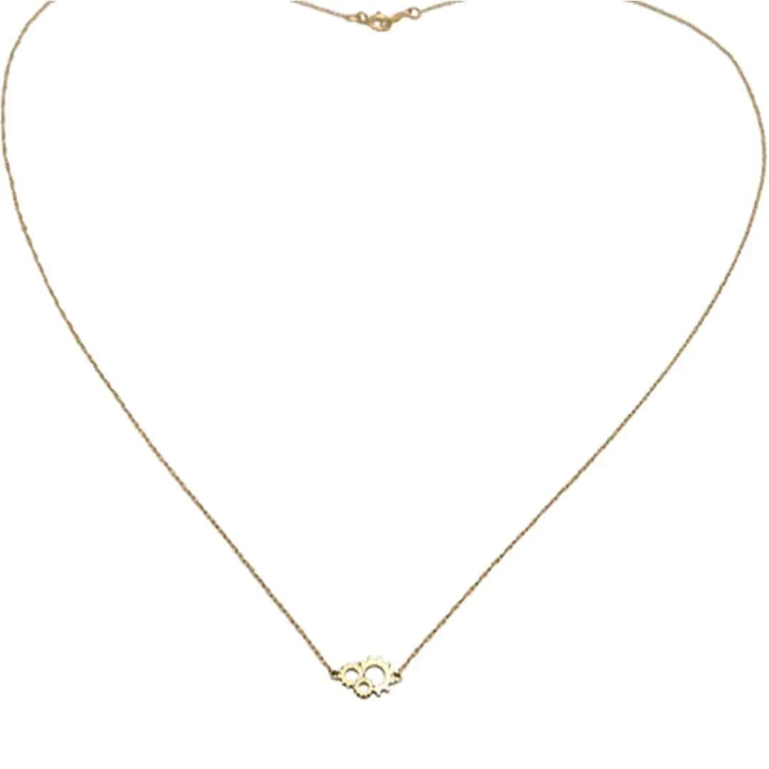 Petra Star Gearhead Necklace featuring a stylish metallic gear pendant on a delicate chain.