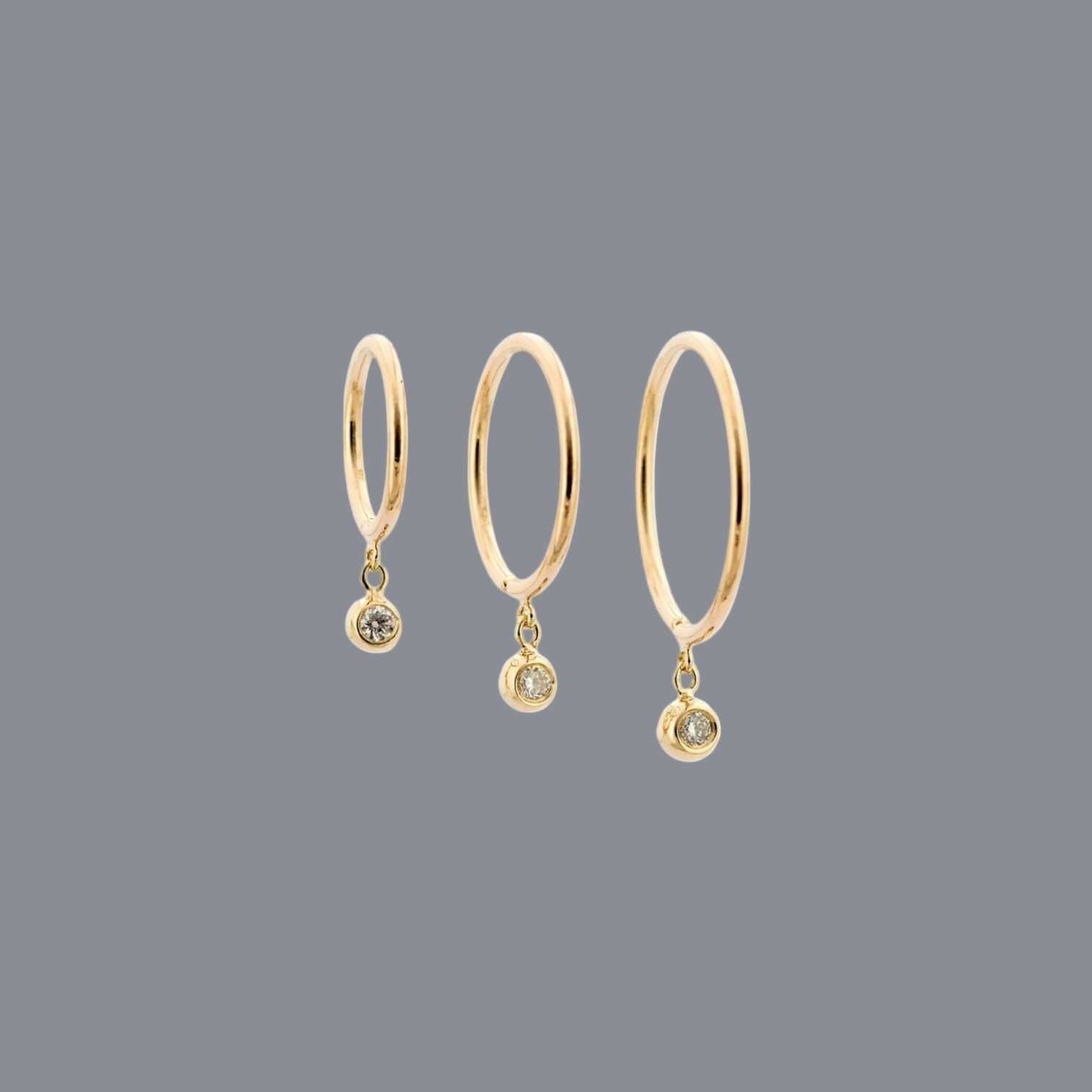 Diamond Droplet Huggie Earrings in 14k Yellow Gold - Petra Star