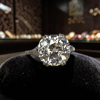 Petra Star Vintage Vault Collection | c. 1905 Edwardian Platinum Solitaire Ring | 7.57ct Old Mine Cut Diamond - Petra Star