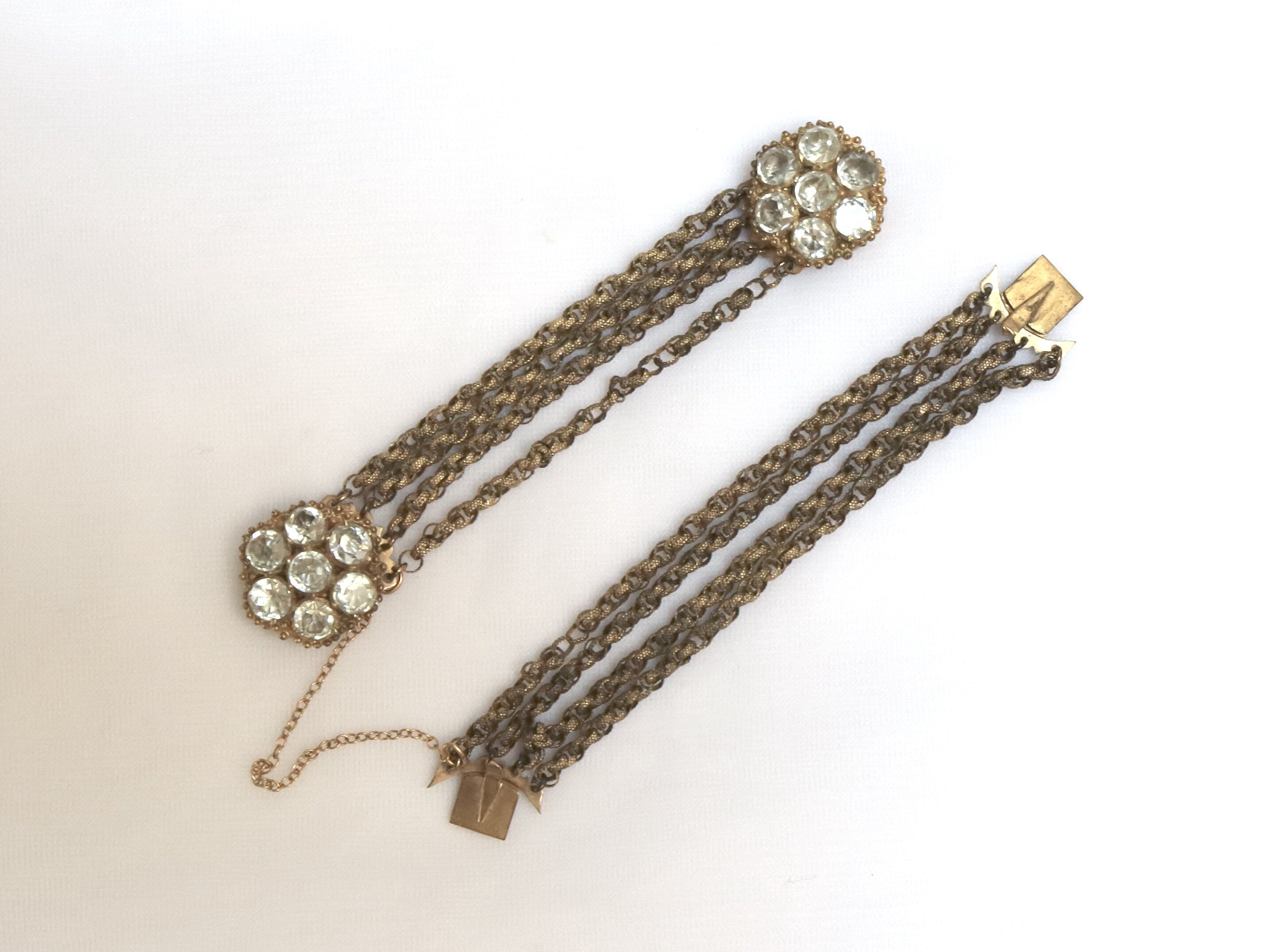 Vintage Pinchbeck multi-row Georgian chain bracelet with paste links featuring intricate design and antique craftsmanship.