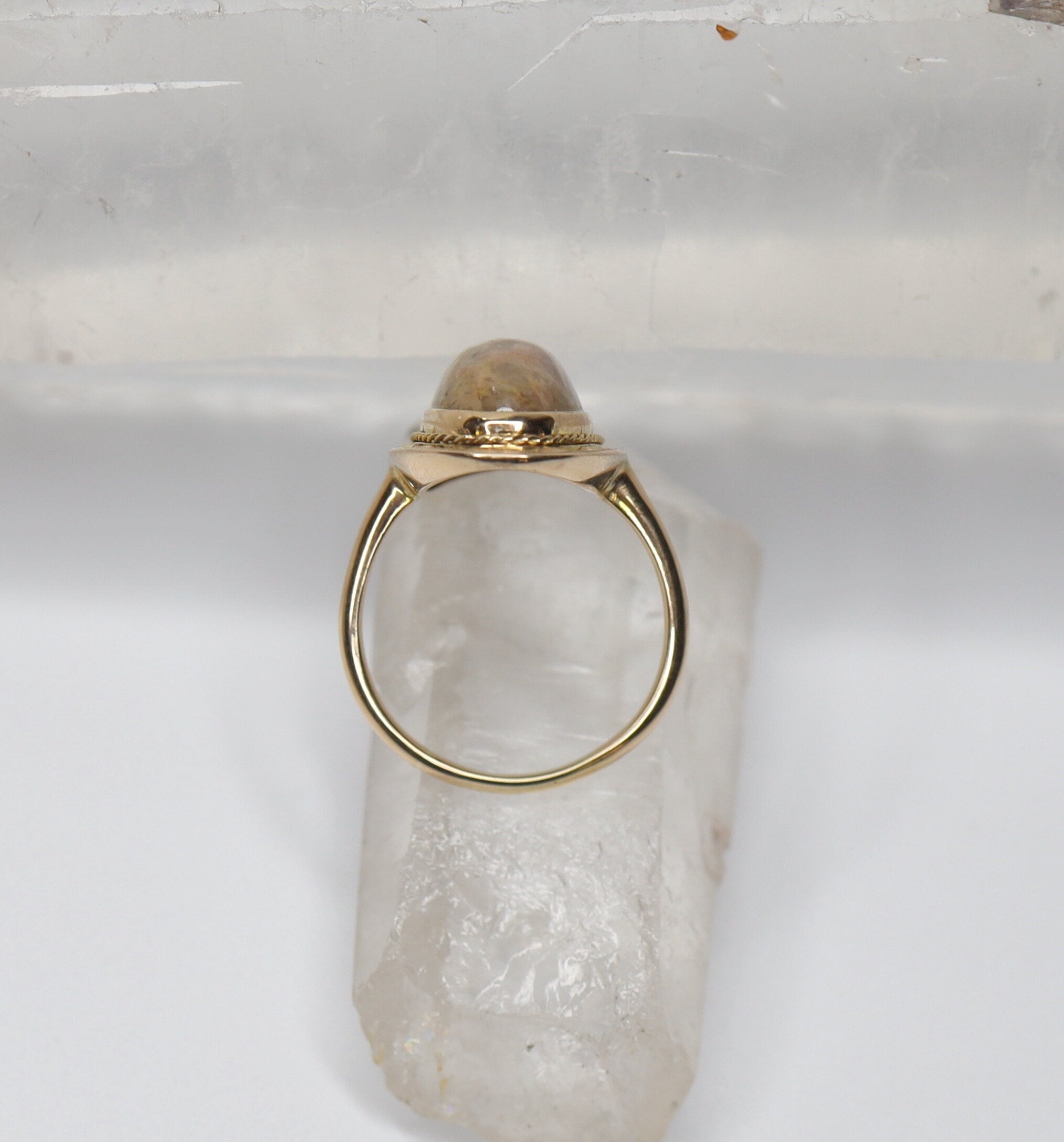 Vintage Jasper ring set in 14k yellow gold, showcasing a polished gemstone with intricate design details.