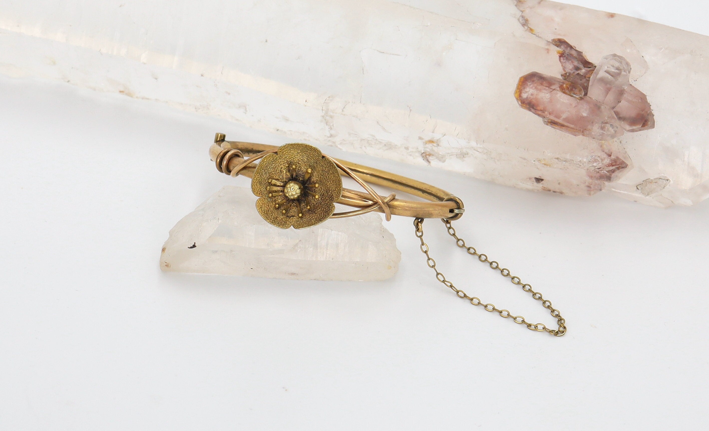 Gold-filled Victorian flower bangle bracelet in child's size, featuring intricate vintage design and floral details.