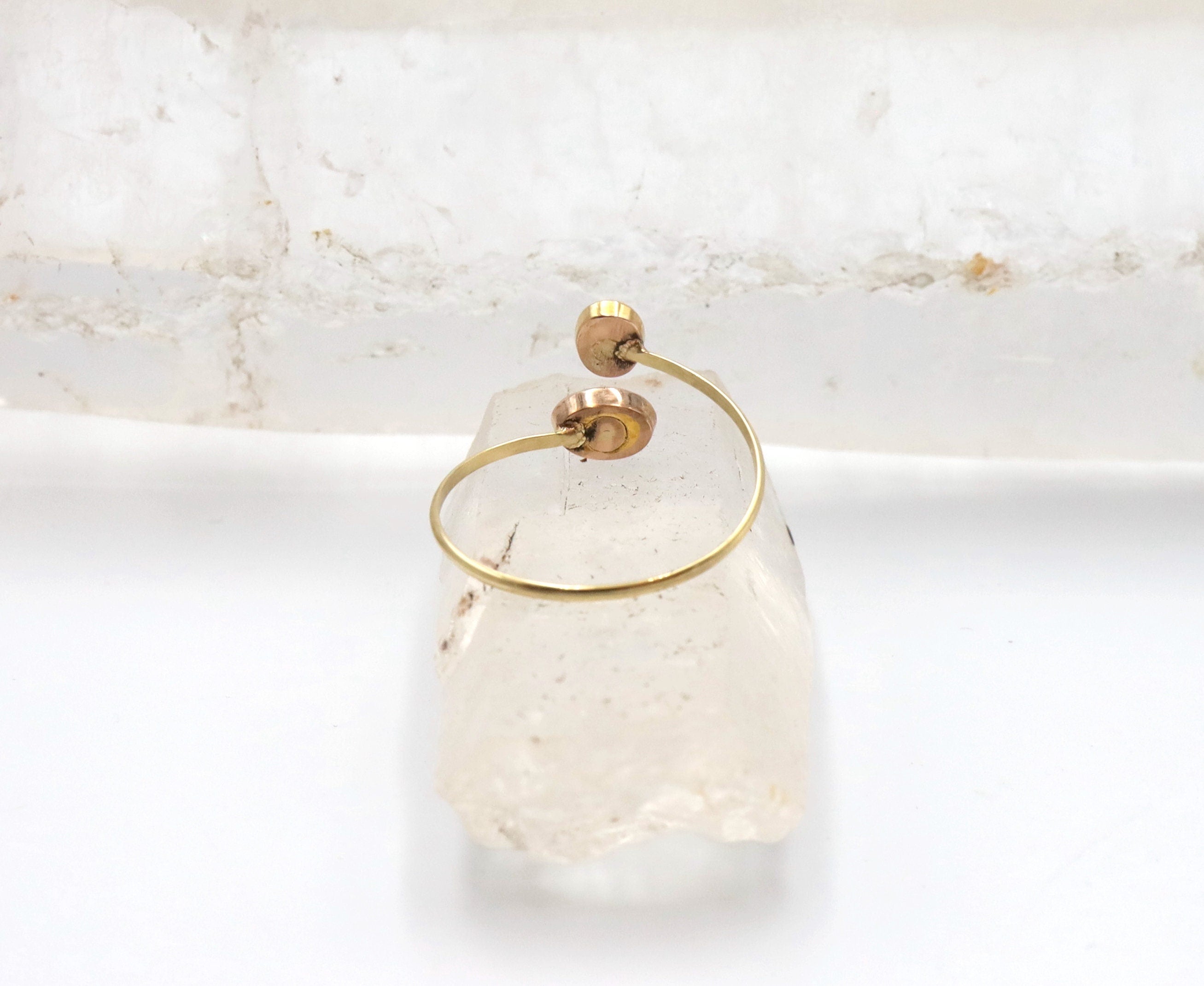 Victorian turquoise Toi et Moi ring by The Vintage Vault featuring two oval turquoise cabochons set in vintage style gold band