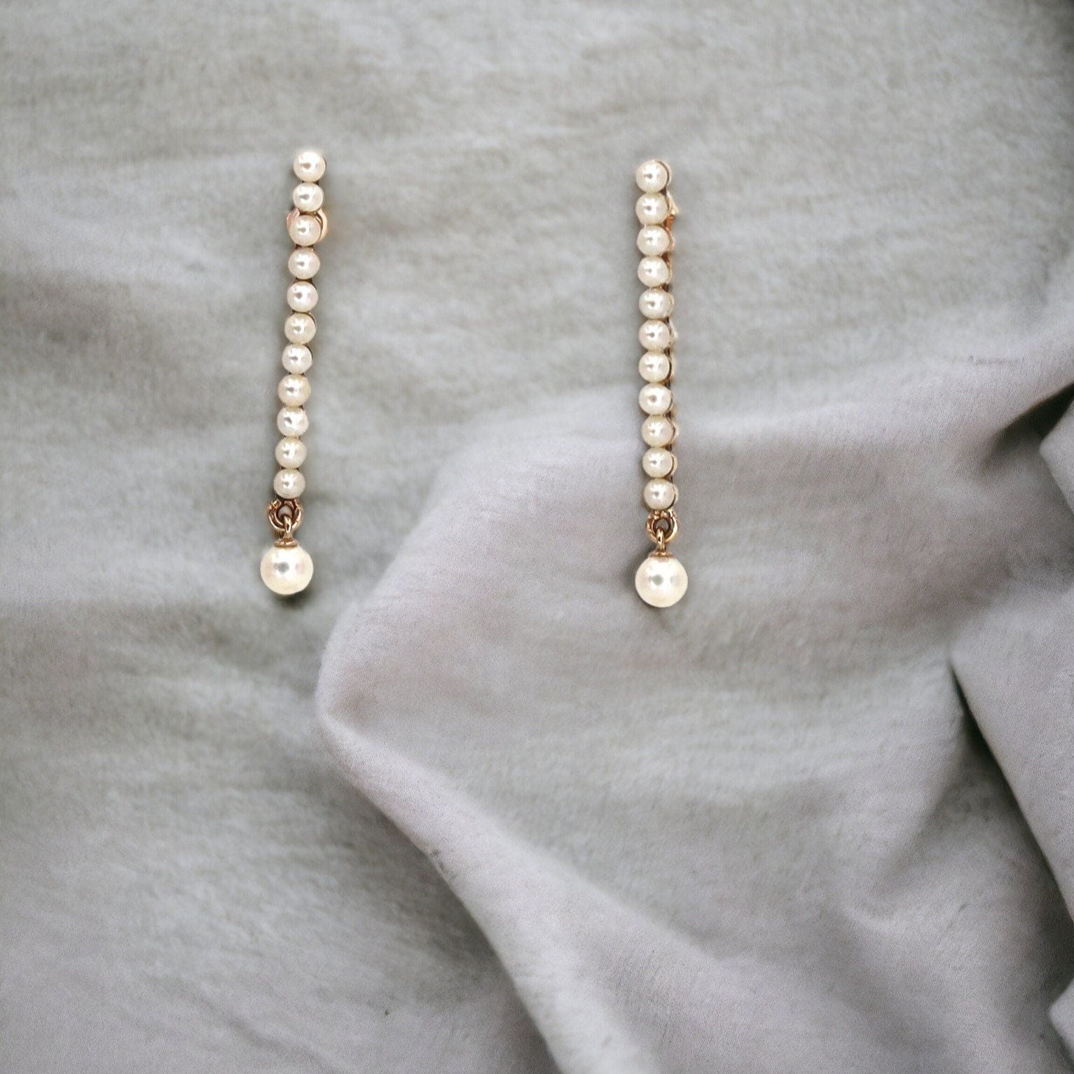 Victorian pearl earrings in 14k rose gold, featuring elegant pearl drops and intricate vintage gold setting.