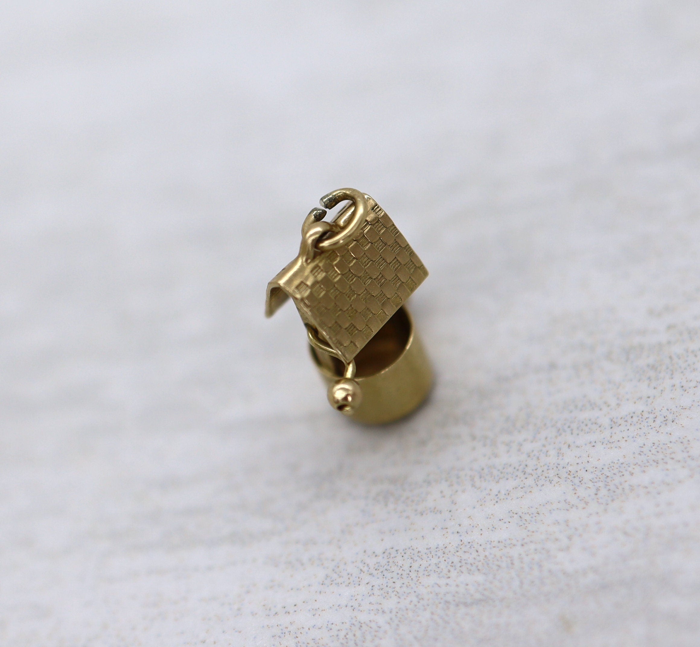 Vintage 14k gold wishing well charm by The Vintage Vault, detailed charm with intricate design, perfect for charm bracelets.