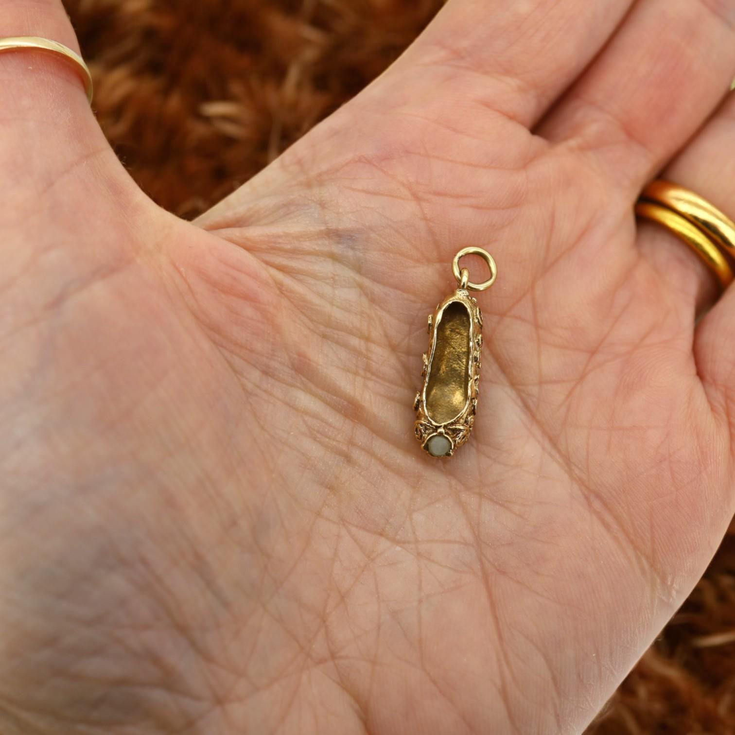 14k gold antique ballet slipper charm with vintage detailing, perfect for jewelry or charm bracelets.