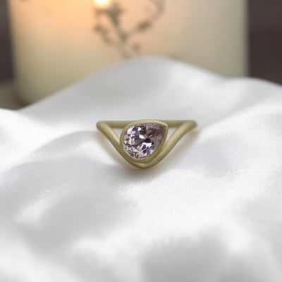 Lavender zircon ring by Petra Star featuring a 2.16ct pear-shaped gemstone set in 14k yellow gold, front view.