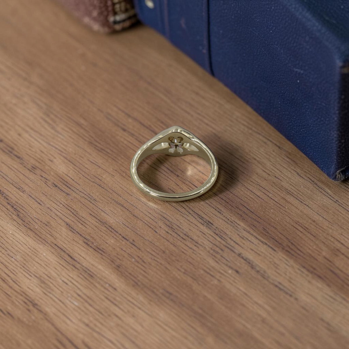 Three-quarter view of the antique diamond Belcher ring