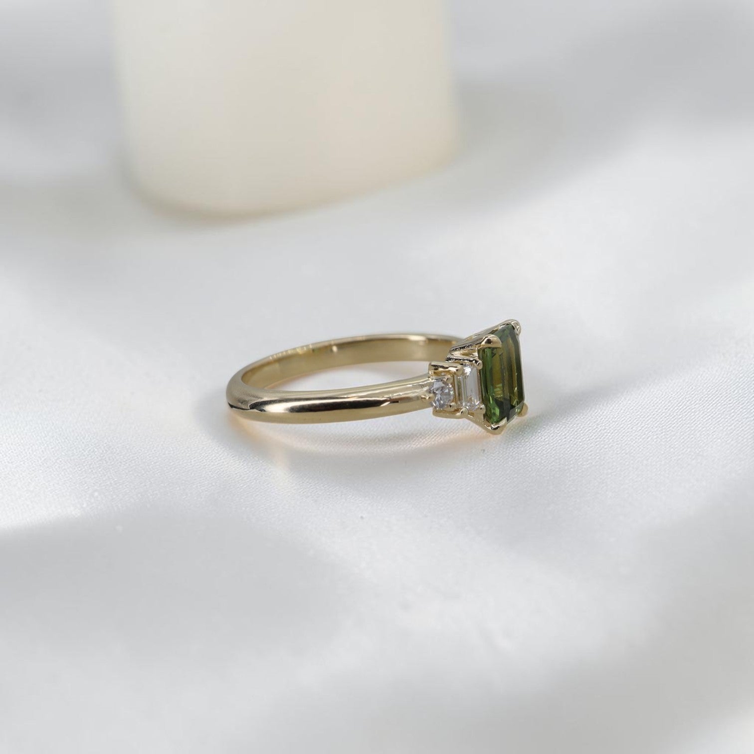 Petra Star 14k yellow gold engagement ring setting with diamond baguette and round brilliant accents, custom-made and made to order.