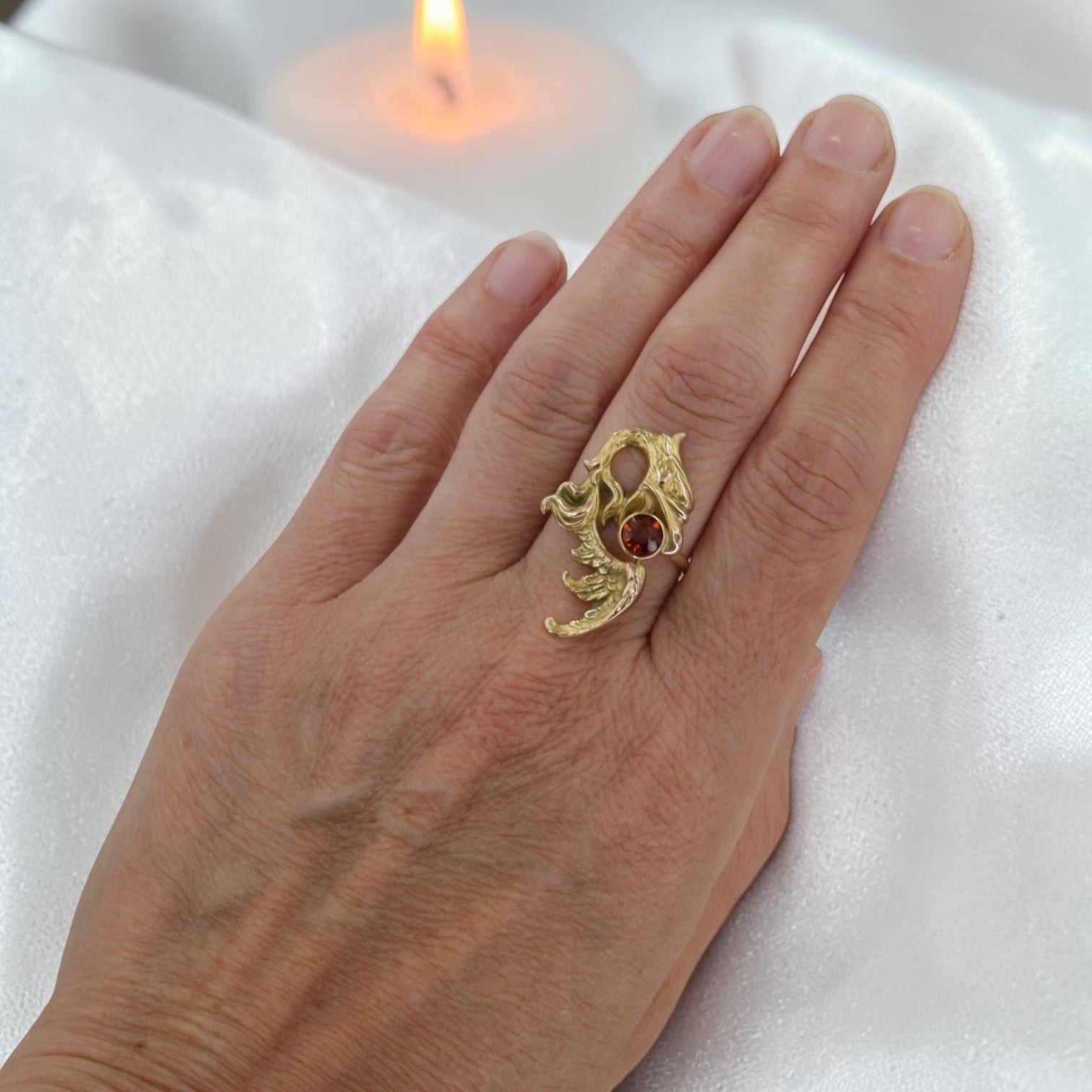 Art Nouveau Griffin Ring in 10k gold with Madeira citrine, worn on hand, featuring intricate vintage design by The Vintage Vault.