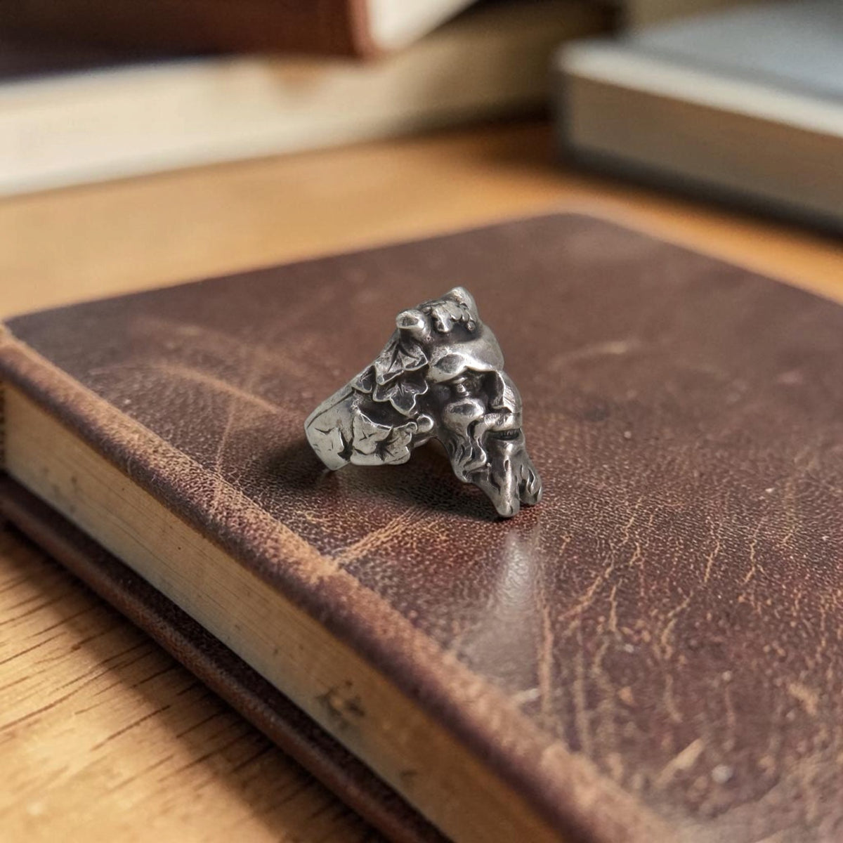 Handmade antique silver satyr ring, angled side view, Petra Star Mystic CT